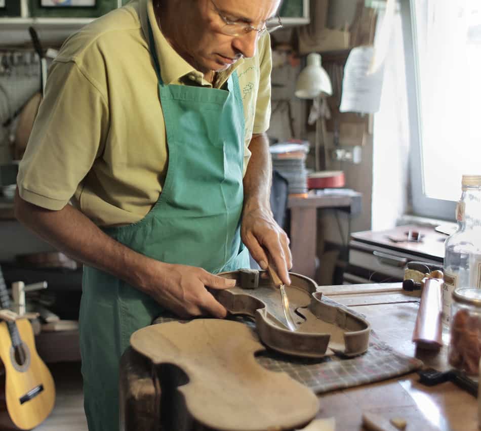 Why do woodworkers wear aprons