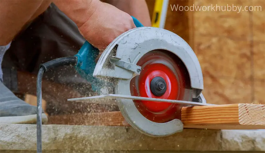 Circular saw cutting wood