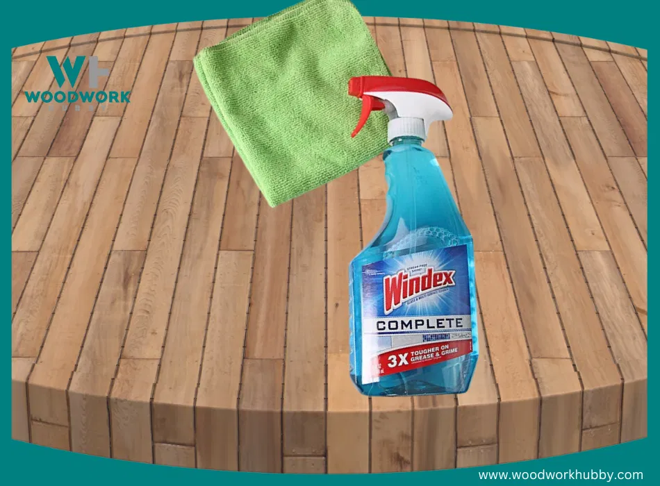 Windex used on wooden table