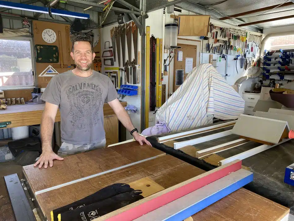 Derek from Woodwork Hubby standing in workshop